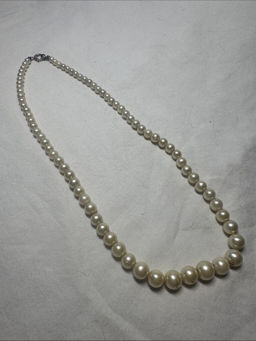 Lot of four faux pearl pieces